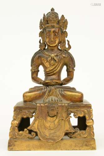 A Chinese gilt and polychrome decorated Buddha, Qianlong mark, 19thC, H 19 cm (missing parts)