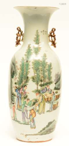 A Chinese polychrome vase, decorated with literati in a landscape, H 58,5 cm (chip on the top rim)
