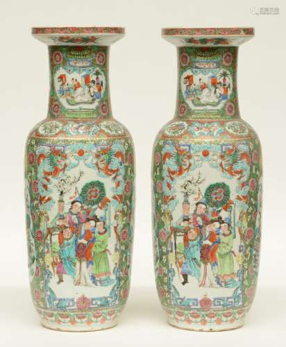 A pair of Chinese 19thC famille rose rouleau vases decorated with animated scenes and birds on flower branches, H 62 cm (chips on the rim, one vase with restoration near to the bottom rim)