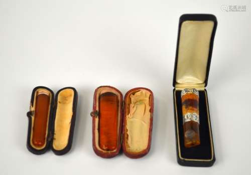 Three Amber Cigarette Holders w/Silver/Gold Mount