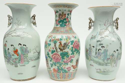 A Chinese famille rose vase decorated with cockerels, 19thC; added two ditto vases decorated with figures in a garden, H 41 - 42,5 cm (one vase with crack in the lip)