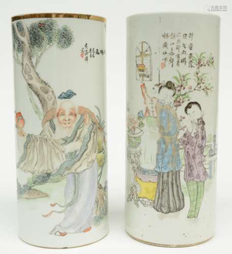 Two Chinese vases, polychroom decorated, one with the figure of Shou Xing and one with an animated scene, H 28,5 cm