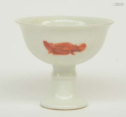 A Chinese 'stemcup', decorated with fish, marked Xuande, H 7,5 cm (some restoration below)