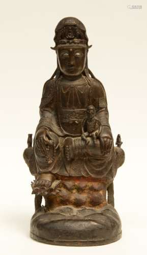 A Chinese bronze Guanyin, Ming, 17thC, H 48 cm (traces of polychromy, damage on the bottom rim)