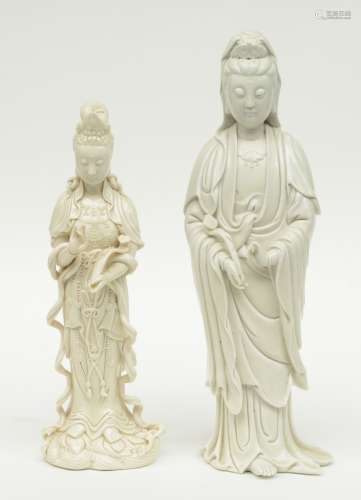 Two Guanyin figures in 'Blanc de Chine', marked, H 35 - 41 cm (one finger of one figure missing)