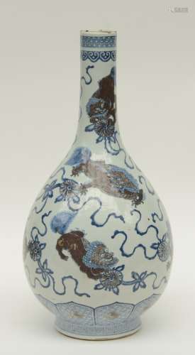A Chinese polychrome decorated vase depicting qilins, marked, 19thC, H 51,5 cm (restoration on the top rim and crack on the bottom)