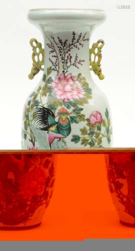 A Chinese famille rose vase, decorated with cockerels on a rock and flower branches, H 57,5 cm (cracks on the bottom)