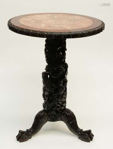 A Chinese carved wooden occasional table with marble top, H 75 - Diameter 59 cm