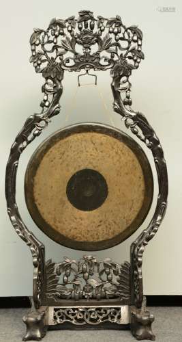 A Chinese bronze gong in a carved hardwood frame, H 128 - W 66 cm