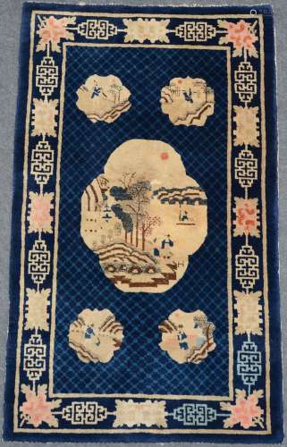 A Chinese Pao Tao wool rug, the roundels decorated with animated scenes, 99 x 166,5 cm