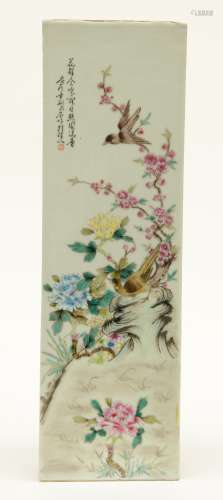 A Chinese famille rose plaque decorated with birds and flower branches, signed, 17,5 x 56 cm