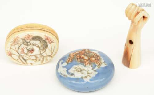 Two Japanese Manju-netsuke, one in ivory and one is porcelain; added a Meiji period ivory netsuke, H 5,5 - W 4 - Diameter 4,3cm, Total weight: ca. 33 g (only ivory)