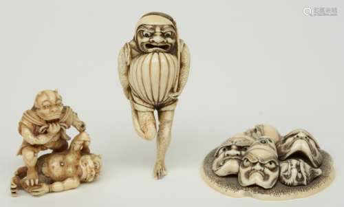 Three exceptional Edo period Japanese ivory katabori-netsuke, two in the form of kappa ('river child'), one in the form of kabuki-theater masks on a field, 18thC, H 7 - Diameter 5,6cm, Total weight 79g (one with minor damage)