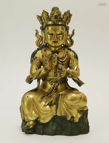 A Chinese Gilt Bronze Seating Buddha