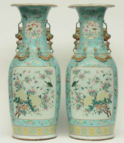 A pair of impressive Chinese turquoise-ground famille rose vases, decorated with birds and flower branches, 19thC, H 91 - 92 cm (chip on the relief decoration)