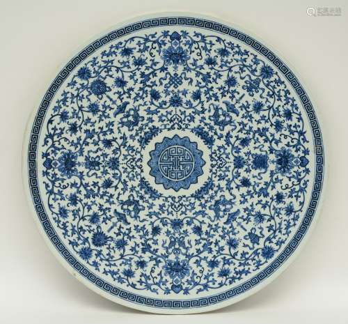 A large Chinese blue and white floral tile, Diameter 51,5 cm