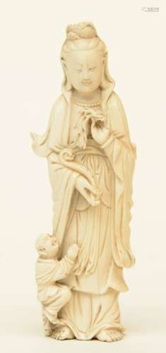 A Chinese ivory Guanyin accompanied by a child, Canton, third quarter of the 19thC, H 16 cm, Weight: 148 g
