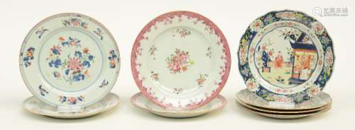 Six Chinese famille rose dishes, decorated with a garden scene and floral motifs, 18thC; added two ditto export rose-Mandarin dishes, Diameter 22,5 - 23,5 cm (chips on the rim)