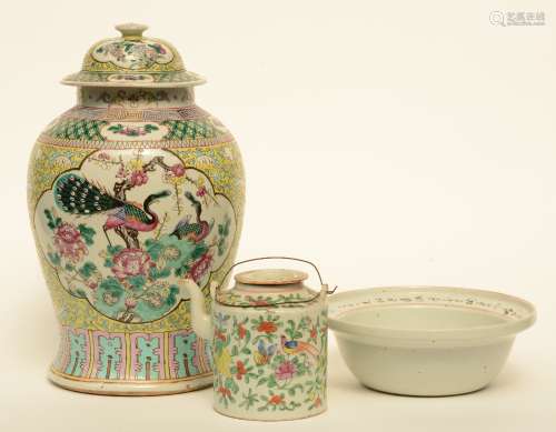 A Chinese famille rose and polychrome decorated with phoenixes, birds, flower branches and a garden scene, 19thC, H 15,5 - 43 cm (vase with restoration in the neck, teapot with chips on the rim)