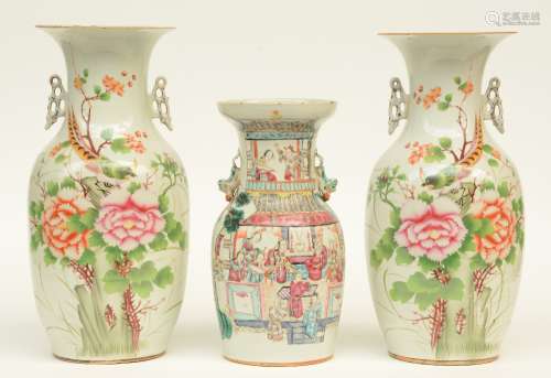 A pair of Chinese polychrome vases, decorated with a bird on flower branches; added a Chinese famille rose decorated with court scenes, 19thC, H 33,5 - 42,5 cm (chips on the rim)