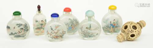 Lot of six Chinese inside-painted glass snuff bottles, H 7,2-8,4 cm; added a late 19thC Beijing ivory magic ball, H 4,8 - B 9 cm, Weight: ca. 45 g (some inside parts missing)