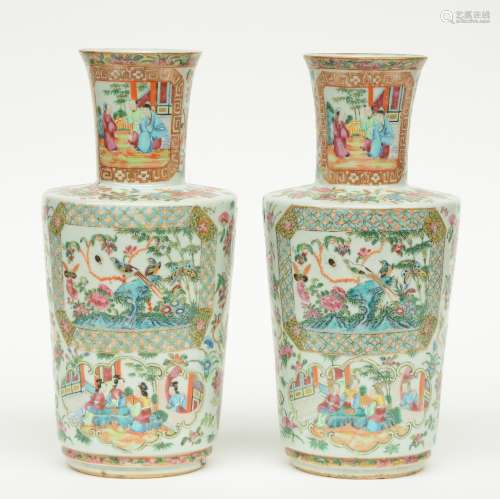 A pair of Chinese Canton famille rose vase, the panels decorated with court scenes and birds on flower branches, marked, 19thC, H 35,5 cm (flaking of the glaze and minor chip)