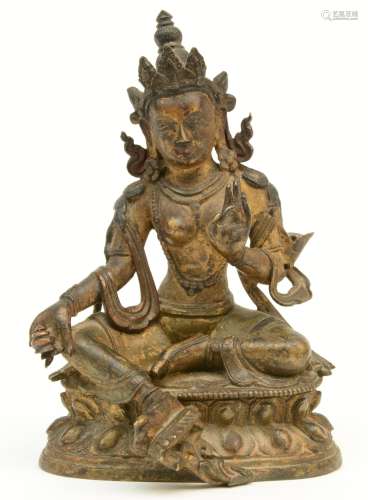 A small Chinese bronze Buddha with traces of gilt paint, Ming, H 12 cm