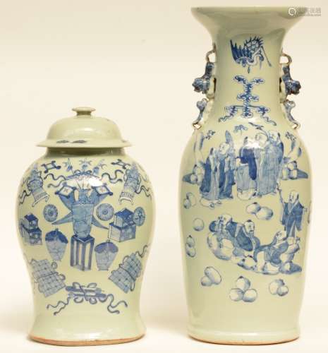 A Chinese celadon ground blue and white vase and vase and cover, one painted with the Eight Immortals and one with antiquities, H 43 - 62 cm (both vases with crack on the bottom and firing faults, one vase with chips on the rim)