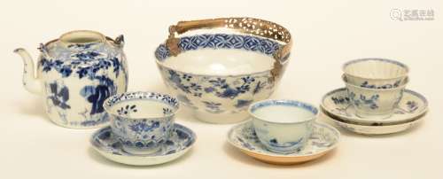 Four Chinese blue and white cups and saucers, and a dito tea pot, 18thC/19thC; added a ditto bowl, lotus relief moulded, with 19thC silver mount, H 4,5 - 9,5 cm - Diameter 11 - 15 cm (chips on the rim, bowl with a crack)