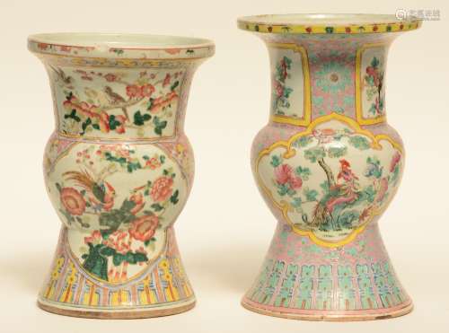 Two Chinese famille rose and polychrome beaker-shaped vases, decorated with phoenixes and birds on flower branches, 19thC, H 31,5 - 34,5 cm (chips on the rim and flaking of the glaze)