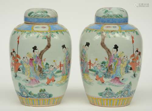 Two Chinese famille rose vases and covers, overall decorated with an animated scene in a garden, 19thC, H 28,5 cm