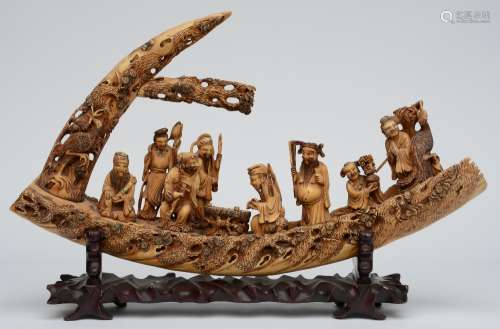 The Eight Mahjong playing Immortals on their magic boat, tinted and scrimshaw decorated ivory, set with coloured pearls, on matching wooden base, H 44 - W 68,5 - D 15 cm - Weight: ca. 6,1 kg (without base)