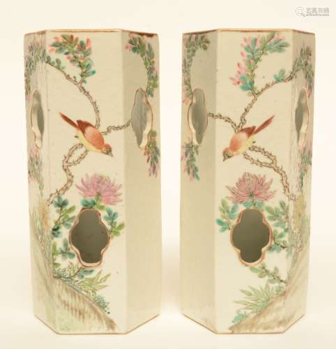 A fine pair of Chinese hexagonal polychrome hat stands, decorated with a bird on a flower branch and calligraphic texts, marked, H 27 cm (chip on the rim)