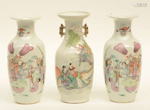 A Chinese pair of vases, polychrome decorated with an animated scene, marked; added a ditto vase, marked and signed, H 26 cm