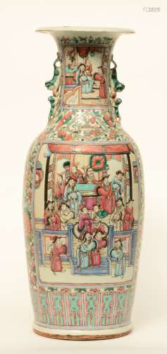 A Chinese famille rose vase, the panels painted with courtscenes, H 60 cm (cracks on the bottom)