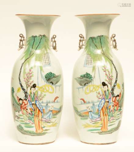 A pair of Chinese polychrome vases, decorated with a lady with children playing in a garden, H 58 (one vase with hairline on the body)