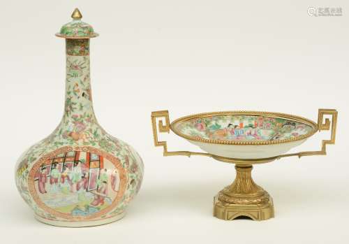 A Chinese Canton bottle vase, famille rose decorated with court scenes, 19thC, added a ditto plate with later gilt brass mounts, H 38 cm / 19,5 cm - Diameter 27 cm (cover not original)
