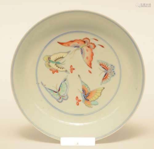 A Chinese doucai dish, decorated with butterflies, marked Yongzheng, probably 