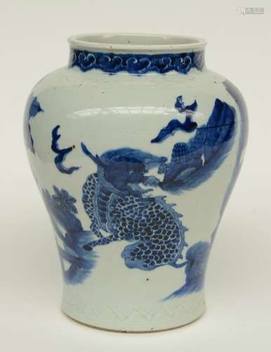 A Chinese blue and white vase, overall decorated with mythical animals in a garden, H 25,5 cm