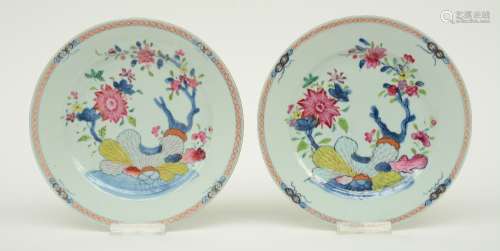 Two Chinese famille rose dishes, decorated with flower branches on a rock, 18thC, Diameter 23,5 cm (minor chips on rim)