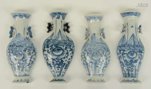 Four Chinese blue and white wall pockets, modeled as vases, decorated with floral motifs, 19thC, H 15 - 16 - W 6 - 7 cm