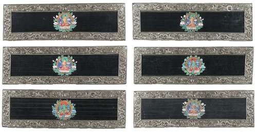 A set of six silver Tibetan manuscript covers