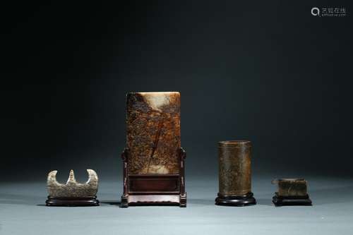 A set of four jade scholar objects