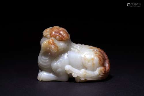 A white jade mythical beast carving