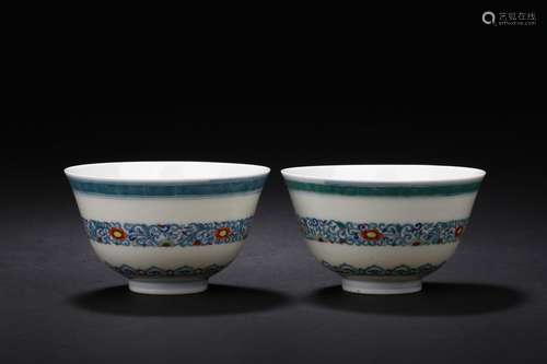 A pair of doucai 'floral scrolling' wine cups