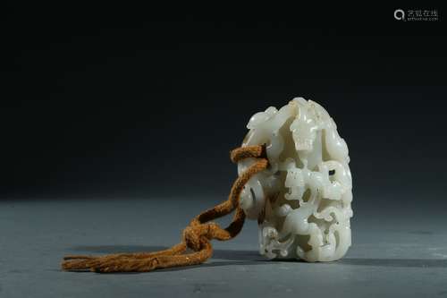 A white jade carved 'dragon' jade seal