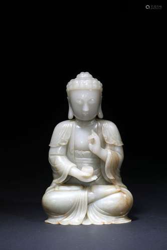 A white jade carved figure of bodhisattva