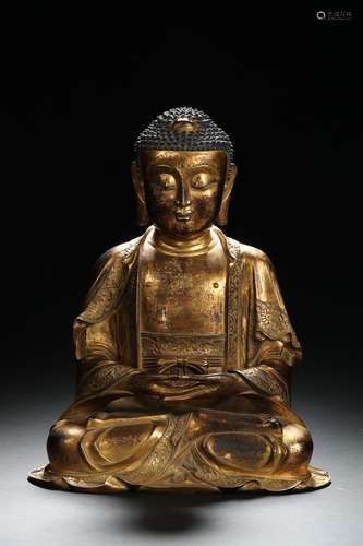 A gilt-bronze figure of Amitabha