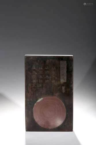 A carved and inscribed inkstone