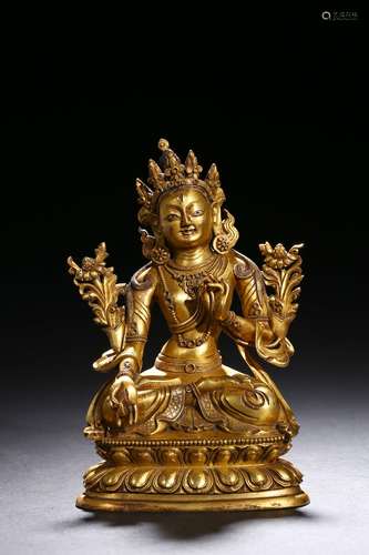 A gilt-bronze statue of bodhisattva